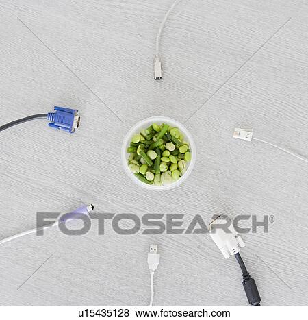 Stock Photo - bean salad and unplugged cables. Fotosearch