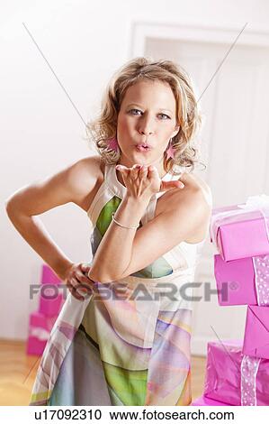 beautiful woman blowing a kiss View Large Photo Image Stock Image - beautiful woman blowing a kiss. Fotosearch