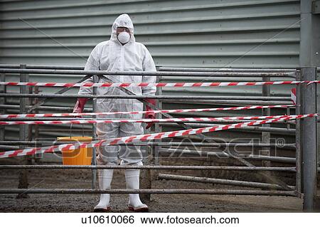bio hazard worker on farm View Large Photo Image Stock Photograph - bio hazard worker on farm. Fotosearch