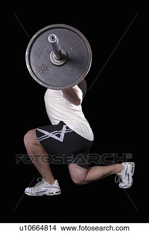 bodybuilder doing lunges View Large Photo Image Picture - bodybuilder doing lunges. Fotosearch