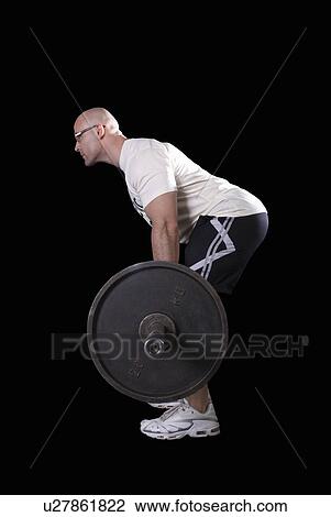 bodybuilder lifting weight View Large Photo Image Stock Image - bodybuilder lifting weight. Fotosearch