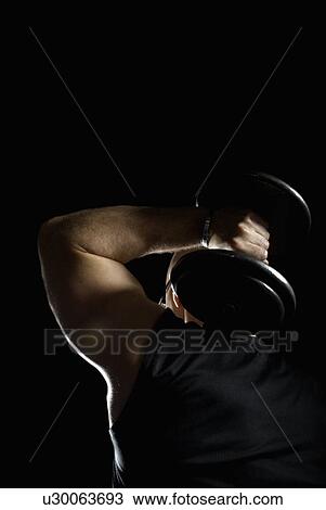 Stock Image - bodybuilder with weight behind head. Fotosearch