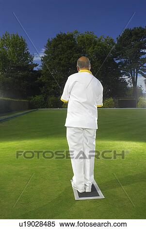 Stock Photography - bowler about to bowl. Fotosearch