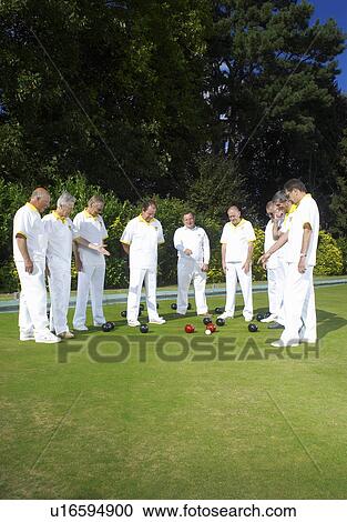 bowlers looking at decision View Large Photo Image Stock Image - bowlers looking at decision. Fotosearch