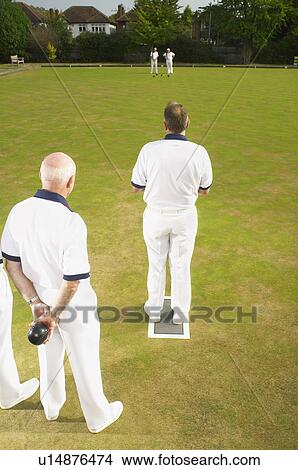 Picture - bowlers on a green. Fotosearch