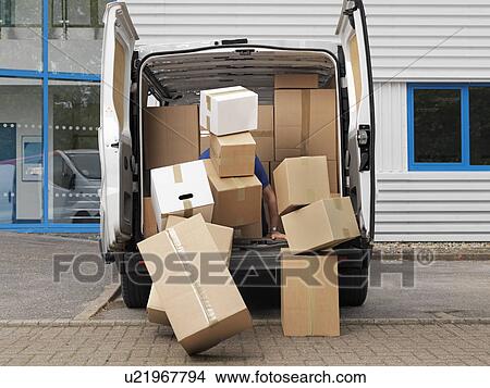 Picture - boxes falling from back of van. Fotosearch