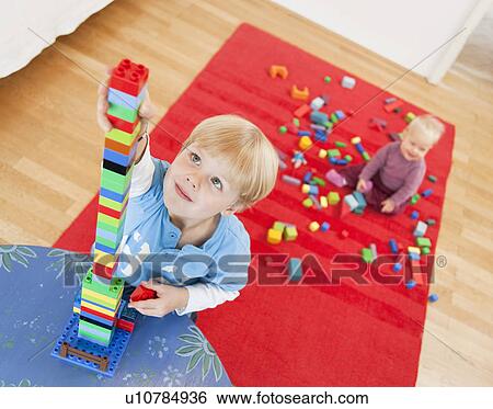 boy and baby with toy building blocks View Large Photo Image Stock Photograph - boy and baby with toy building blocks. Fotosearch