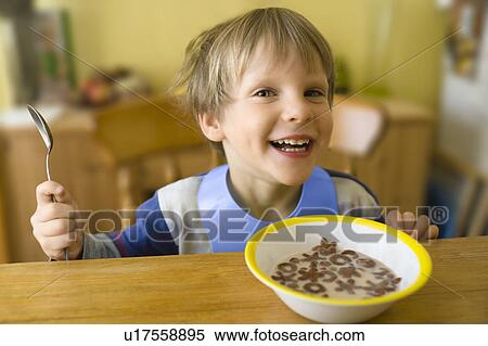 Boy Grinning at Breakfast View Large Photo Image Stock Photography - Boy Grinning at Breakfast. Fotosearch