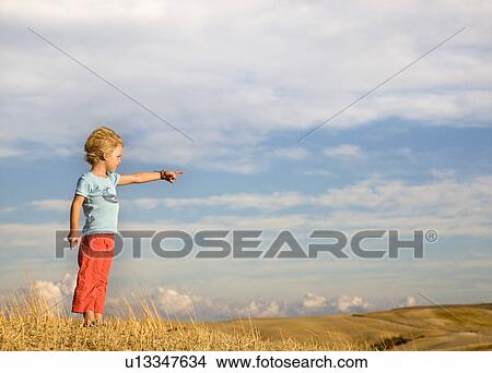 boy pointing into distance View Large Photo Image Picture - boy pointing into distance. Fotosearch