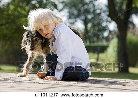 boy with his dog View Large Photo Image Stock Photo - boy with his dog. Fotosearch