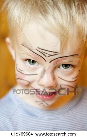 Picture - Boy with painted face. Fotosearch