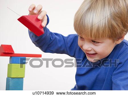 boy with toy building blocks View Large Photo Image Stock Photo - boy with toy building blocks. Fotosearch