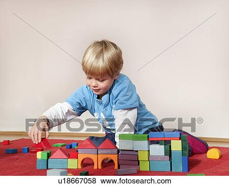 boy with toy building blocks View Large Photo Image Stock Photo - boy with toy building blocks. Fotosearch
