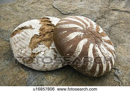 Stock Photograph - Bread on a stone. Fotosearch