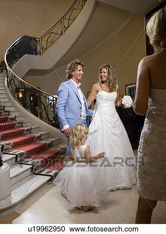 bride and groom descend staircase View Large Photo Image Stock Image - bride and groom descend staircase. Fotosearch