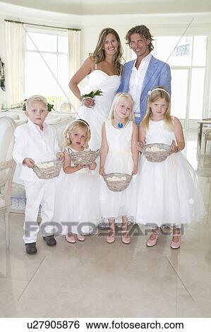 bride and groom with wedding children View Large Photo Image Stock Photograph - bride and groom with wedding children. Fotosearch