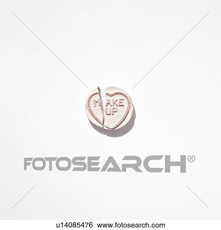 Stock Photograph - Broken Love Heart Sweet. Fotosearch