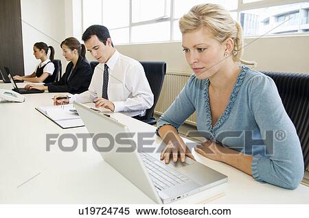 Business colleagues work together View Large Photo Image Stock Photography - Business colleagues work together. Fotosearch