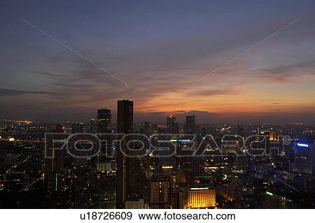 Stock Photo - business district of Bangkok at sunset. Fotosearch