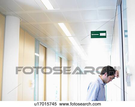 Business man against the wall View Large Photo Image Stock Photography - Business man against the wall. Fotosearch