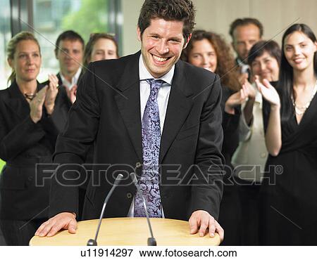 Business man giving a conference View Large Photo Image Stock Photo - Business man giving a conference. Fotosearch