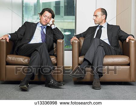 Business men in a waiting room View Large Photo Image Stock Photo - Business men in a waiting room. Fotosearch