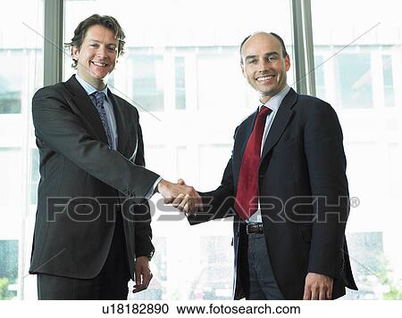 Business men shaking hands View Large Photo Image Stock Image - Business men shaking hands. Fotosearch