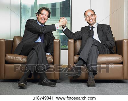 Business men shaking hands View Large Photo Image Stock Image - Business men shaking hands. Fotosearch