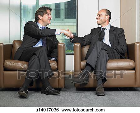 Business men shaking hands View Large Photo Image Stock Photograph - Business men shaking hands. Fotosearch