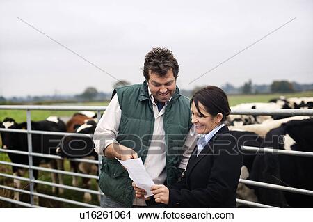 business woman advising farmer View Large Photo Image Picture - business woman advising farmer. Fotosearch