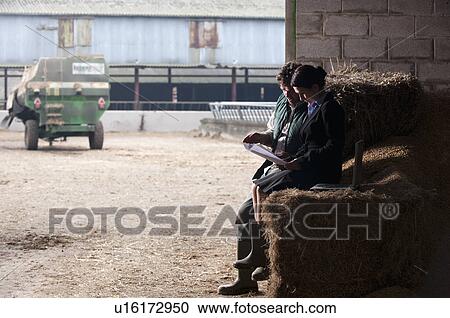 business woman advising farmer View Large Photo Image Stock Image - business woman advising farmer. Fotosearch