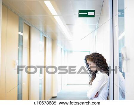 Business woman against the wall View Large Photo Image Stock Photography - Business woman against the wall. Fotosearch