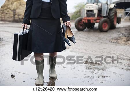 business woman arriving at farm View Large Photo Image Stock Image - business woman arriving at farm. Fotosearch