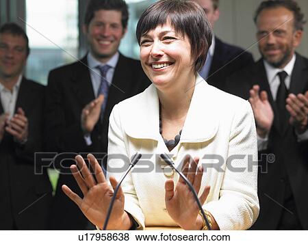 Business woman giving a conference View Large Photo Image Stock Photo - Business woman giving a conference. Fotosearch