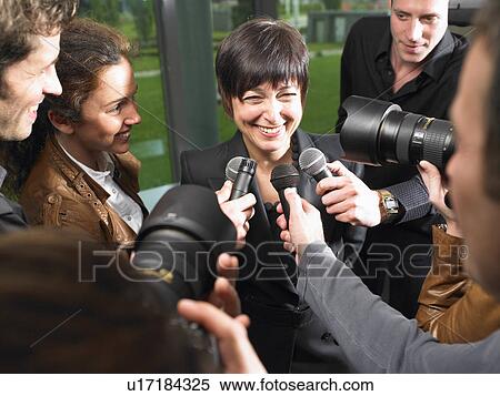 Business woman giving a conference View Large Photo Image Stock Photography - Business woman giving a conference. Fotosearch
