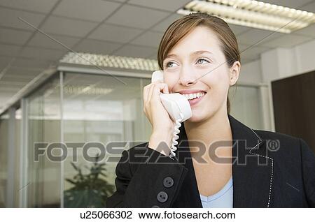 Business woman on the telephone View Large Photo Image Stock Image - Business woman on the telephone. Fotosearch