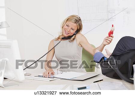 Business woman with baby. View Large Photo Image Stock Photo - Business woman with baby.. Fotosearch