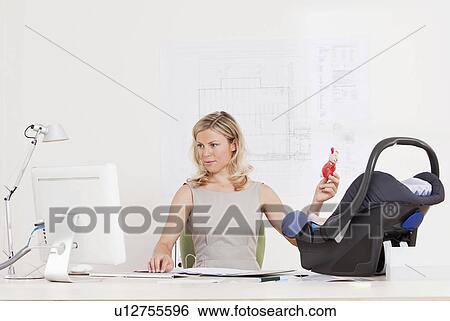 Business woman with baby. View Large Photo Image Stock Photograph - Business woman with baby.. Fotosearch