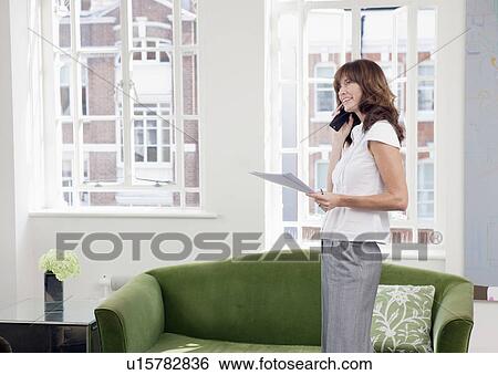 Business women on mobile phone View Large Photo Image Stock Photograph - Business women on mobile phone. Fotosearch
