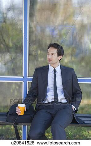 businessman at bus stop, waiting View Large Photo Image Stock Photograph - businessman at bus stop, waiting. Fotosearch