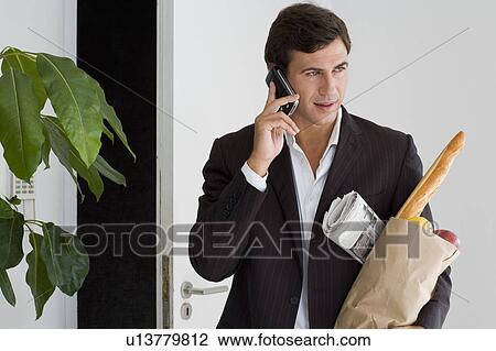 Businessman at home View Large Photo Image Stock Image - Businessman at home. Fotosearch