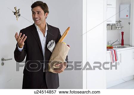 Businessman at home View Large Photo Image Stock Photo - Businessman at home. Fotosearch