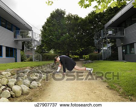 Stock Photo - businessman doing exercises. Fotosearch