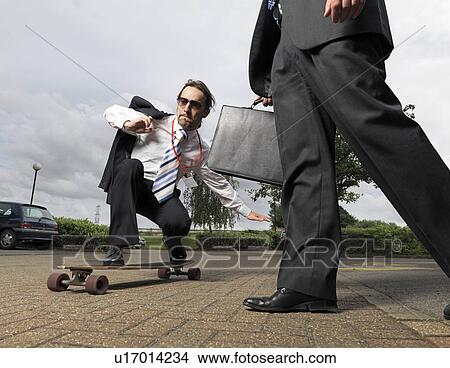 businessman on skateboard View Large Photo Image Picture - businessman on skateboard. Fotosearch