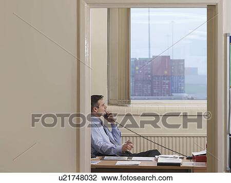 Businessman On Telephone In Port View Large Photo Image Stock Image - Businessman On Telephone In Port . Fotosearch