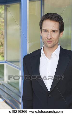 businessman waiting at bus stop View Large Photo Image Stock Photograph - businessman waiting at bus stop. Fotosearch