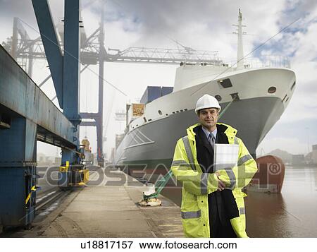 Businessman With Container Ship View Large Photo Image Stock Photo - Businessman With Container Ship. Fotosearch