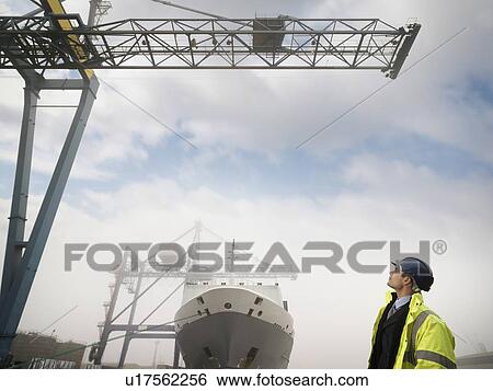 Stock Photograph - Businessman With Container Ship. Fotosearch