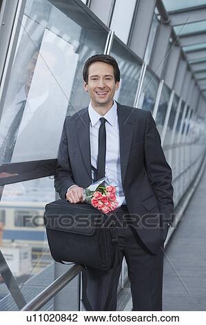businessman with flowers, happy View Large Photo Image Stock Image - businessman with flowers, happy. Fotosearch