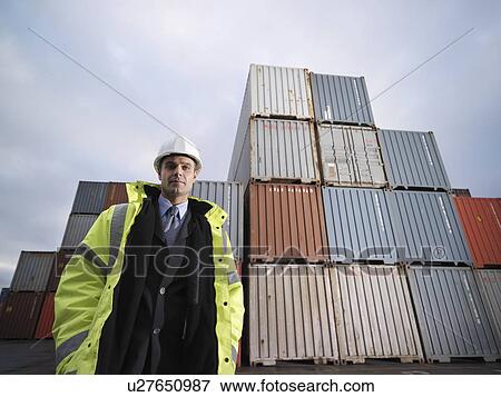 Businessman With Shipping Containers View Large Photo Image Stock Photo - Businessman With Shipping Containers. Fotosearch